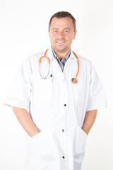 Portrait of a young handsome man doctor isolated on white