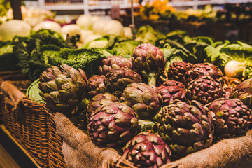close-up shot of fresh artichokes selling on farmers market, Rome, Italy