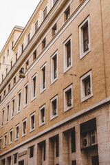 Fototapeta na wymiar bottom view of grey building in Rome, Italy