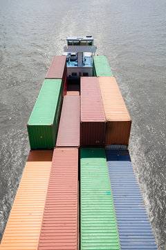 Sea bearing cargo trading ship in canal