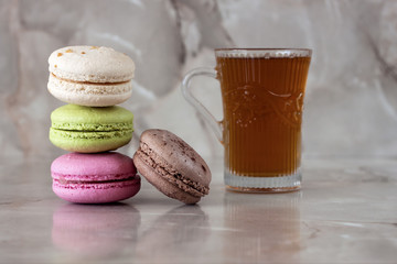 Colourful tasty macaroons in a row