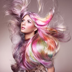 Beauty Fashion Model Girl with Colorful Dyed Hair. Girl with perfect Makeup and Hairstyle. Model with perfect Healthy Dyed Hair. Rainbow Hairstyles