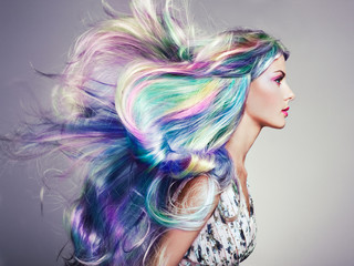 Beauty Fashion Model Girl with Colorful Dyed Hair. Girl with perfect Makeup and Hairstyle. Model...