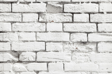 Niveous background of white painted old brick wall