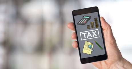 Fototapeta na wymiar Tax concept on a smartphone