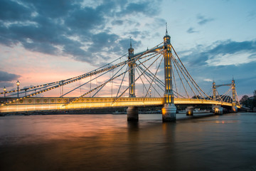 Fototapeta na wymiar Albert Bridge and beautiful sunset over the Thames, London, England UK