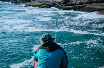 Fisherman on the seashore