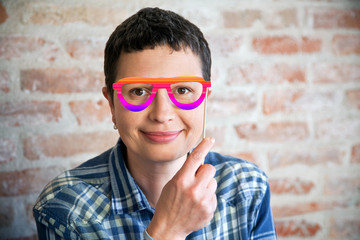 Woman with fake eyeglasses