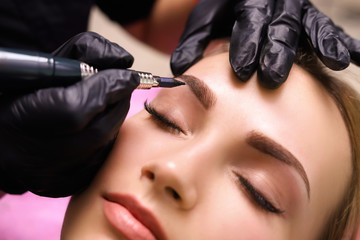Permanent make up on eyebrows. - obrazy, fototapety, plakaty