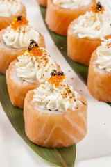 Japanese rolls with salmon and flying fish roe