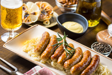 Grilled Sausages with Cabbage Salad, Mustard and Beer. Bratwurst and Sauerkraut.