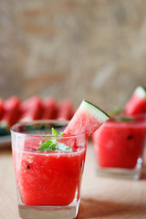 Watermelon drink on wooden background.