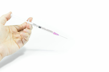 Woman holding syringe on isolated white background.