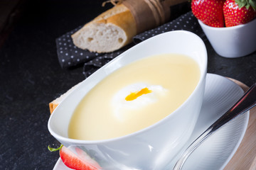 asparagus soup with poached egg and fresh baguettes