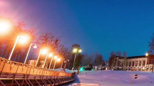 Dobrush, Gomel Region, Belarus. Time Lapse Time-lapse Timelapse From Evening To Night Of Old Paper Factory Tower In Winter Season. Night Stars Sky Above Historical Heritage