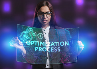 The concept of business, technology, the Internet and the network. A young entrepreneur working on a virtual screen of the future and sees the inscription: Optimization process