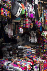 Fototapeta premium Colorful traditional peruvian fabrics on the market