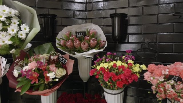 Fresh Flower Arrangements In Florist Shop, Pan Shot