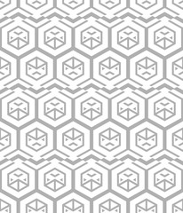 Abstract seamless pattern of hexagons and triangles.