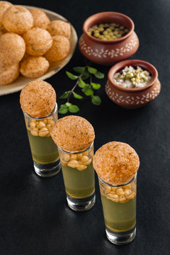 Pani Puri, a north Indian street snack made of fried puries and mint water which is all time favourite.