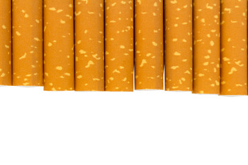 Closeup of a pile of cigarettes on white background