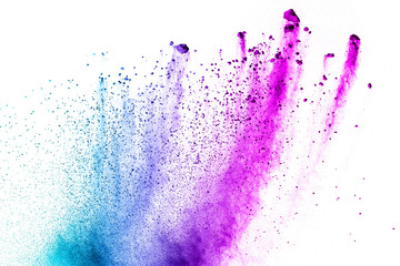 Multi color powder explosion isolated on white background. Color dust splash cloud on white...