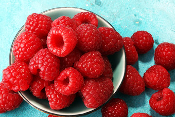 raspberries. Raspberry on blue background. Summer and healthy food concept