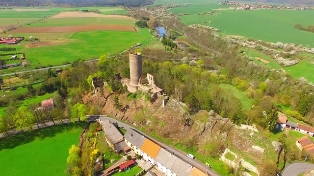 Drone flight around Zebrak Castle. A ruin of a Gothic castle originated in the 13th century. Since 1336 a royal castle, enlarged by Kings Charles IV. Czech famous monument from above. 