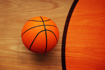Fototapeta premium Basketball ball on court floor