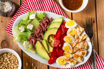 American garden salad Cobb salad with fresh vegetables and chicken
