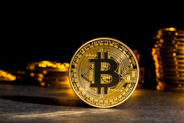 Bitcoin cryptocurrency coin on a dark background