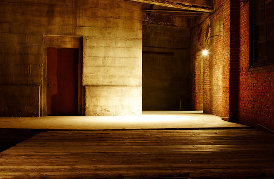 Concrete and brick walls in empty factory space