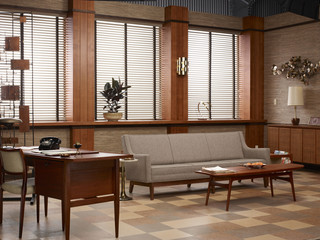 Desk and sofa in retro style office