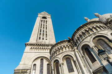 The Sacre Coeur basilica bell tower from the rear in Montmare, Paris, France