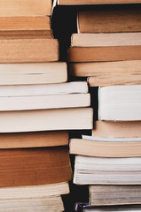 Opened Educational Books Stacked on Desk from Above
