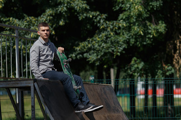 Obraz premium Young boy skater in the park