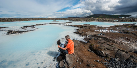 Obraz premium Business man at Blue lagoon