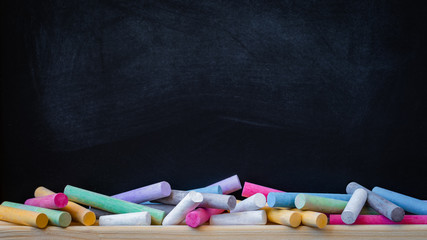 School or college blackboard background with colourful chalk