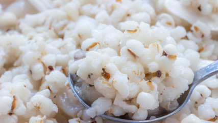 Coix lacryma-jobi is cooked with longan and coconut is a food with high nutritional value.