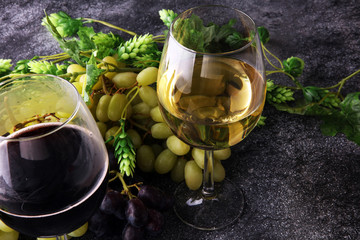Wine glass and Bottle on table. Red and white wine