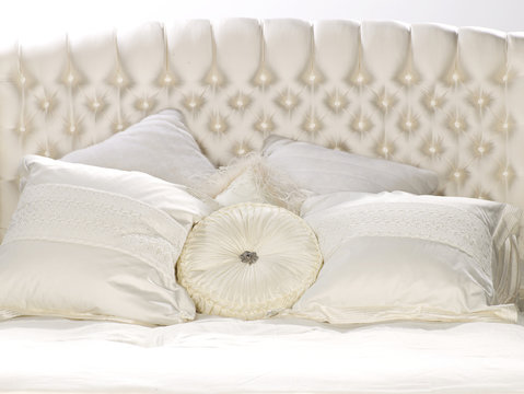 Throw pillows and headboard studio shot