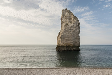 The pointed formation called L'Aiguille or the Needle and Porte d'Aval at Etretat, a commune in the Seine-Maritime department in the Normandy region of north western France