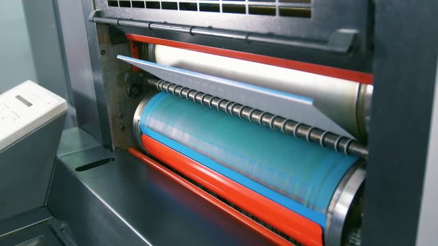 Working process of professional equipment in typography