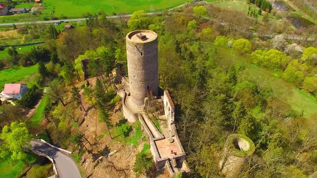 Drone flight around Zebrak Castle. A ruin of a Gothic castle originated in the 13th century. Since 1336 a royal castle, enlarged by Kings Charles IV. Czech famous monument from above. 