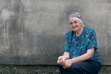 Portrait of a senior woman looking at the camera with a warm friendly smile