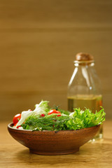 Bowl of salad  and olive oil