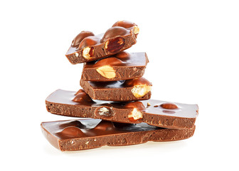 Chocolate pieces with nuts on a white background