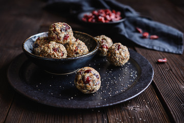 Healthy oatmeal balls with chia seeds, cranberries, coconut, flax seeds and honey