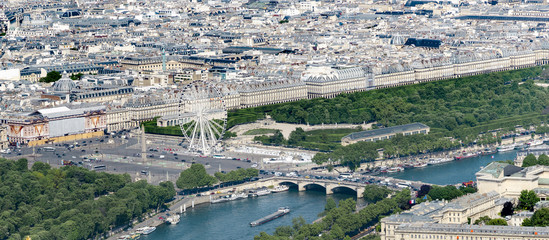 Obraz premium Aerial view of Concorde square and bridge with Ferris wheel, Obelisk and Tuileries Garden near Louvre museim in Paris, France
