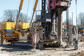 pile bore machine. A pile driver is a mechanical device used to drive piles, poles into soil to provide foundation support for buildings